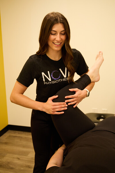 Nova team member and physiotherapist providing hands on treatment for a pelvic health client